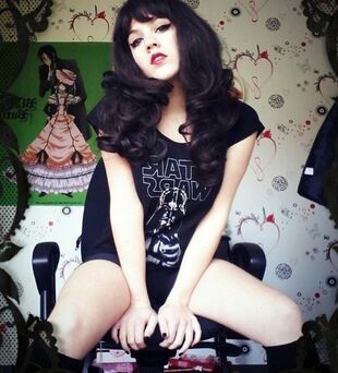 Goth maiden posing for facebook,